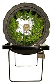 Green Spirit's Omega Garden system consists of a rotating cylinder that houses plants arranged around a central light source. CREDIT: Green Spirit